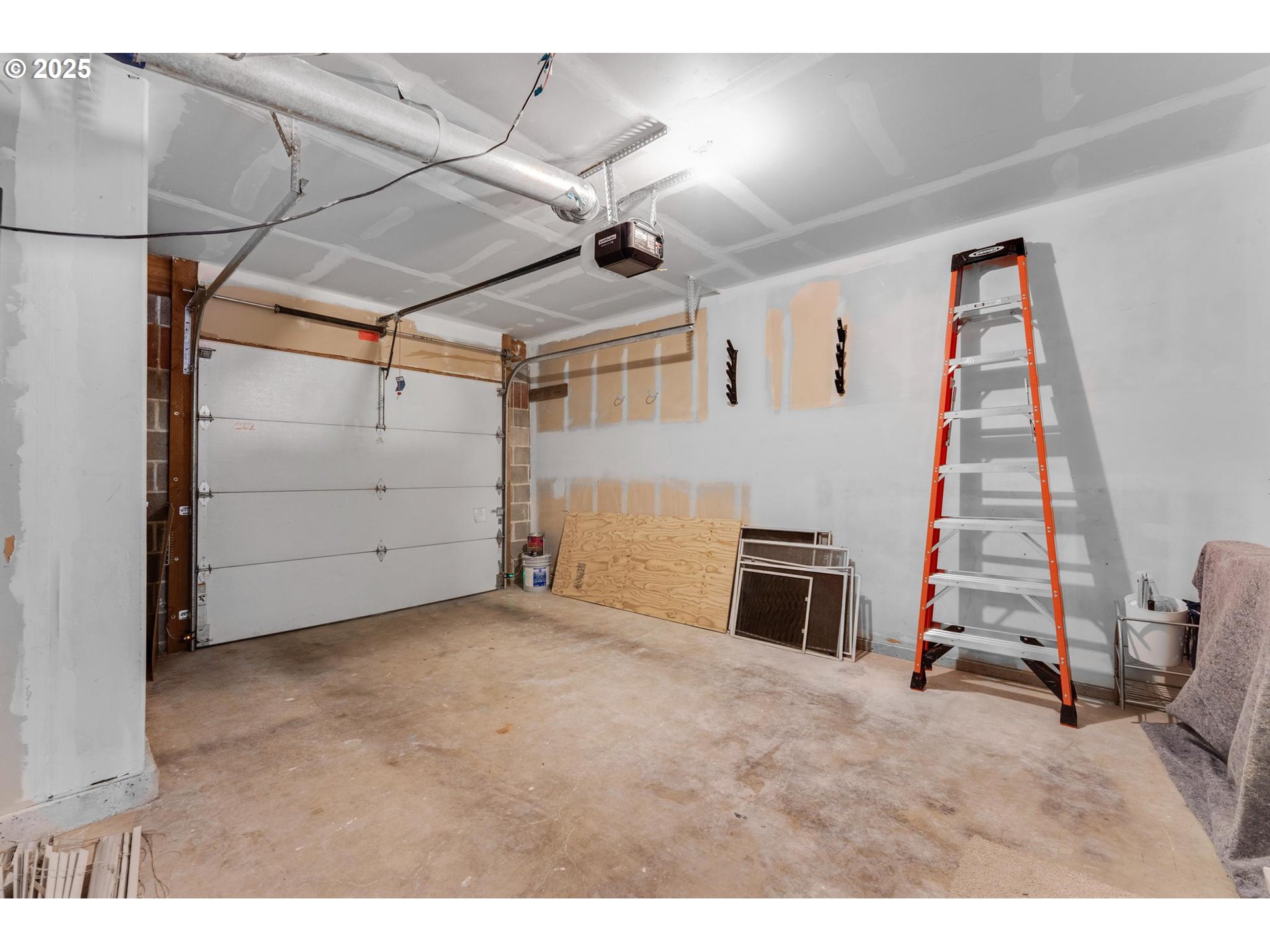 4815 Southwest 1st Avenue Portland, OR 97239 - Photo 28 of 43 a view of a livingroom with furniture staircase and a ceiling fan