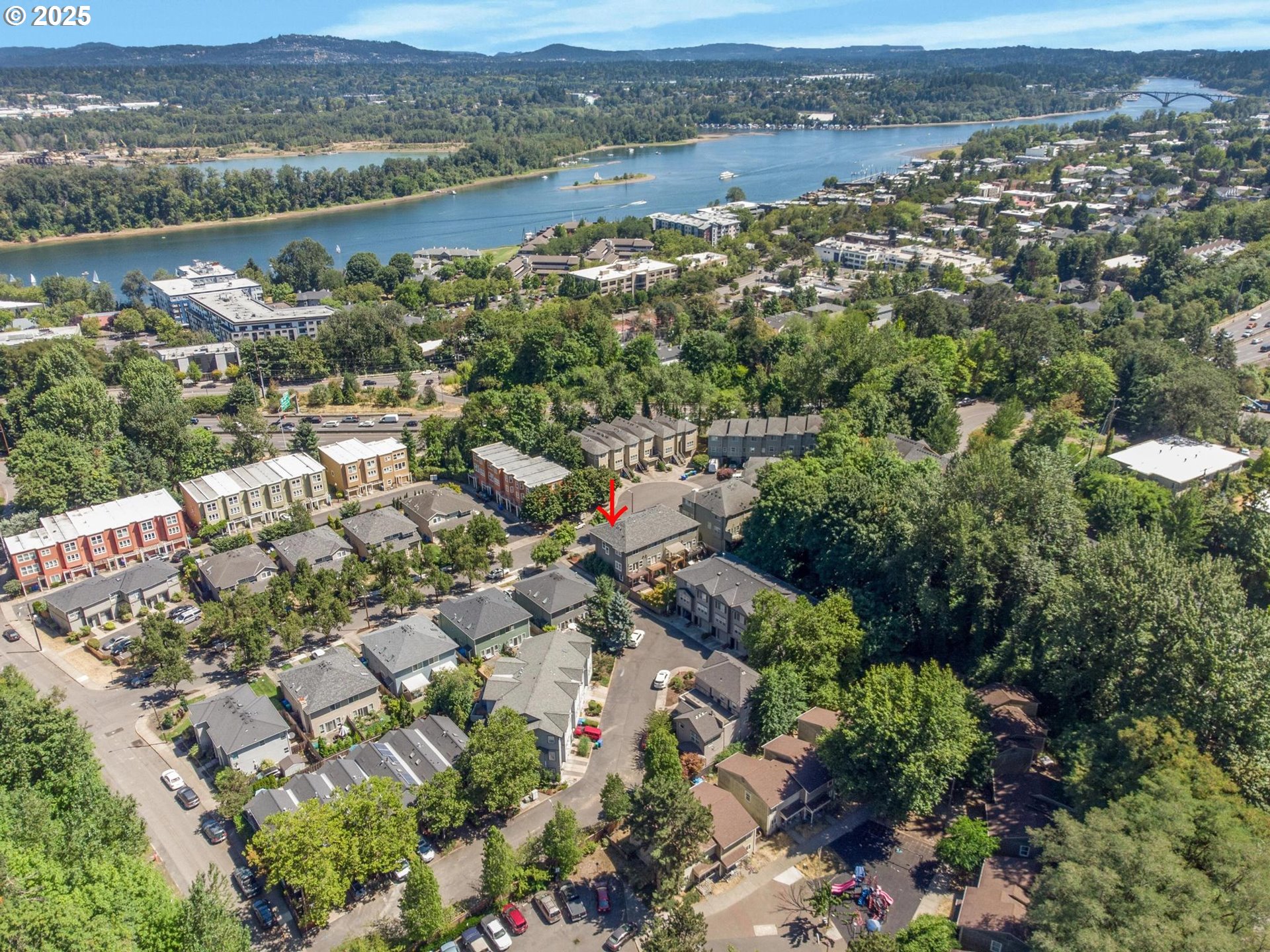 4815 Southwest 1st Avenue Portland, OR 97239 - Photo 33 of 43 an aerial view of lake and residential houses with outdoor space