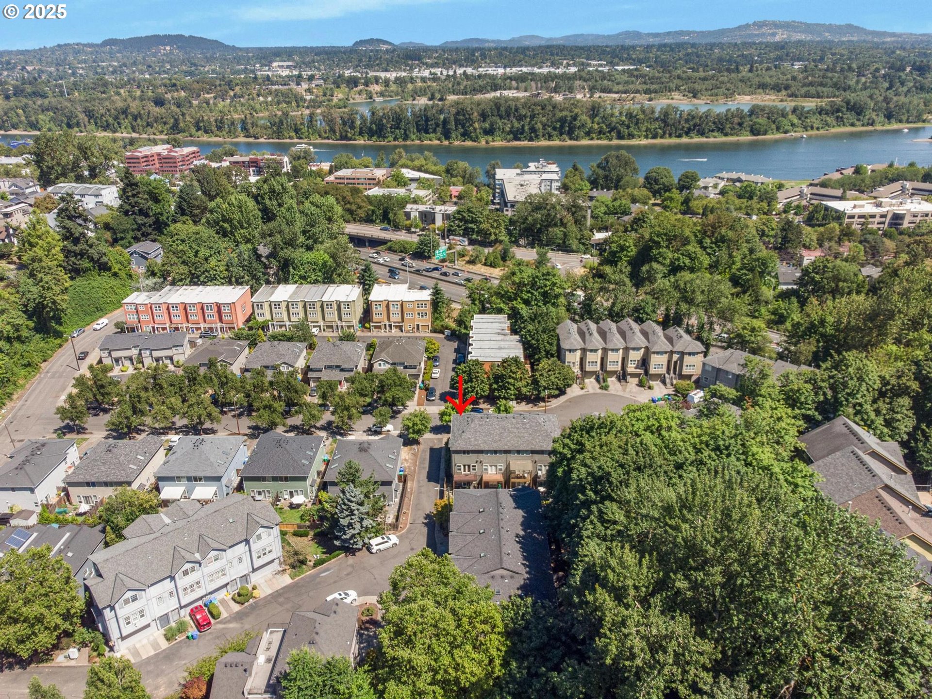 4815 Southwest 1st Avenue Portland, OR 97239 - Photo 34 of 43 an aerial view of a city with lots of residential buildings