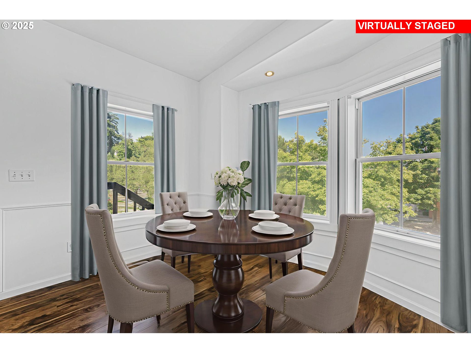 4815 Southwest 1st Avenue Portland, OR 97239 - Photo 4 of 43 a view of a dining room with furniture window and outside view