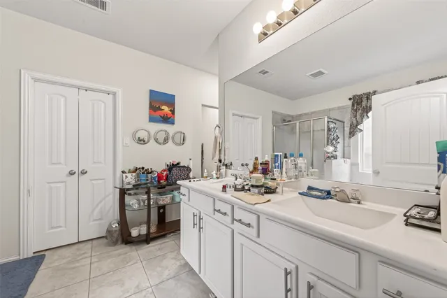 a view of a room that has a lot of kitchen appliances