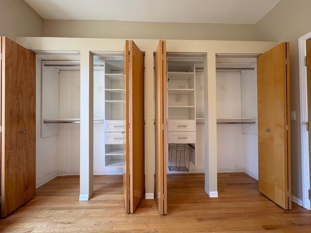 1543 North Hudson Avenue, Unit 2 Chicago, IL 60610 - Photo 14 of 19 an empty room with wooden floor closet and windows