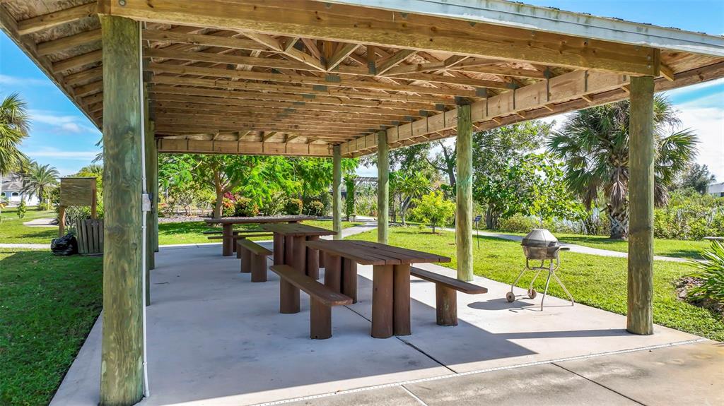 9155 Agate Street Port Charlotte, FL 33981 - Photo 11 of 30 a view of a porch with chairs and backyard