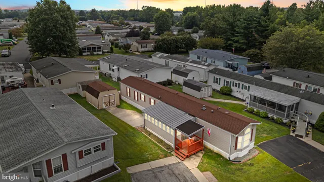 an aerial view of a house with a garden