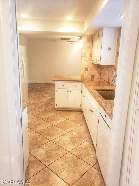 5692 Eichen Circle Fort Myers, FL 33919 - Photo 15 of 33 a bathroom with a granite countertop sink and a mirror