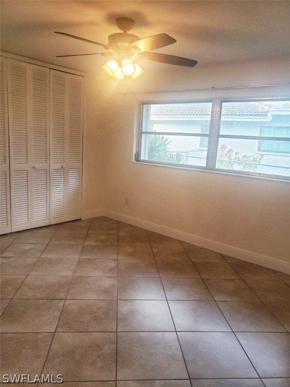 5692 Eichen Circle Fort Myers, FL 33919 - Photo 17 of 33 a view of a livingroom with an empty space and window