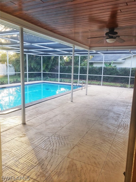 5692 Eichen Circle Fort Myers, FL 33919 - Photo 27 of 33 a view of an empty room with wooden floor and a window