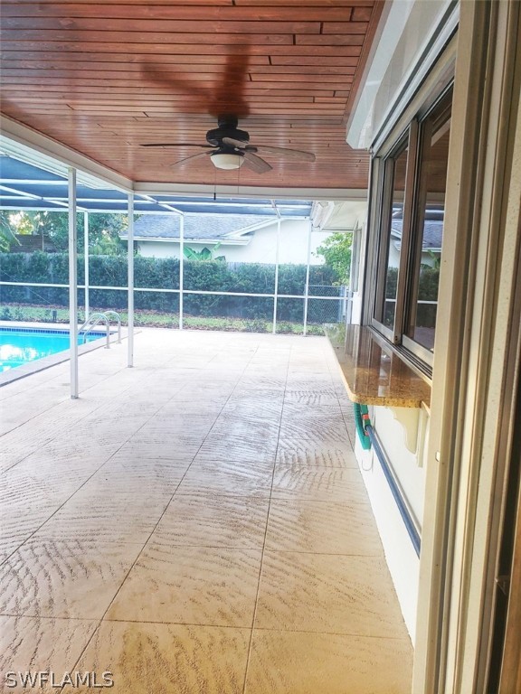 5692 Eichen Circle Fort Myers, FL 33919 - Photo 28 of 33 a view of an empty room with a balcony