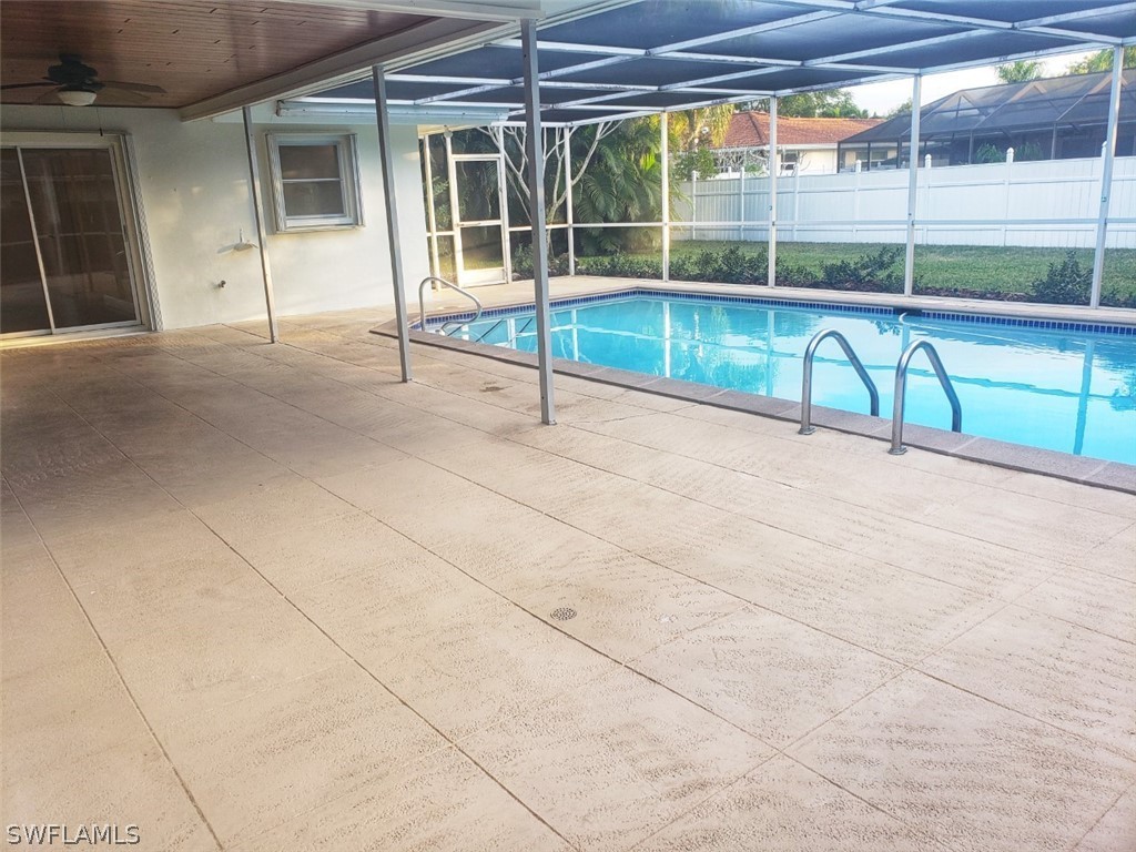 5692 Eichen Circle Fort Myers, FL 33919 - Photo 29 of 33 a view of a house with a swimming pool