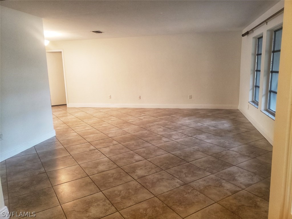 5692 Eichen Circle Fort Myers, FL 33919 - Photo 5 of 33 a view of an empty room with a sink