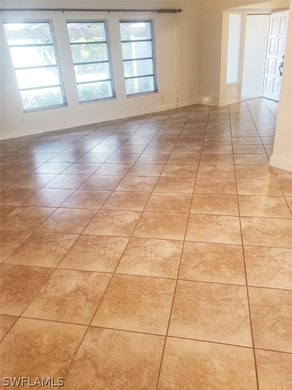 5692 Eichen Circle Fort Myers, FL 33919 - Photo 6 of 33 a view of an empty room with a window