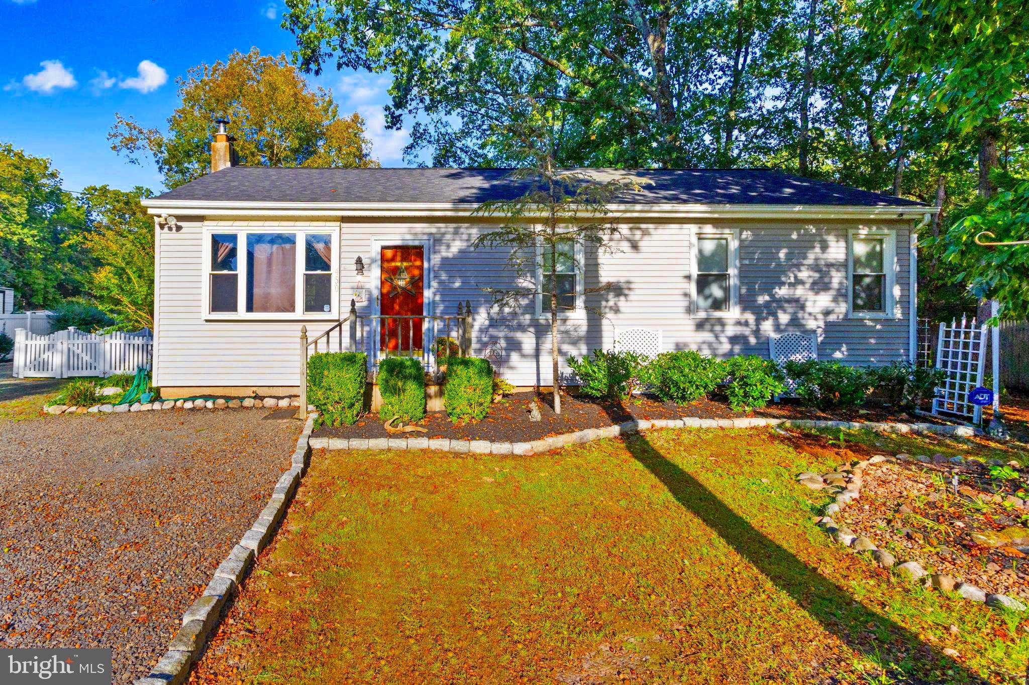 a view of a house with basketball court