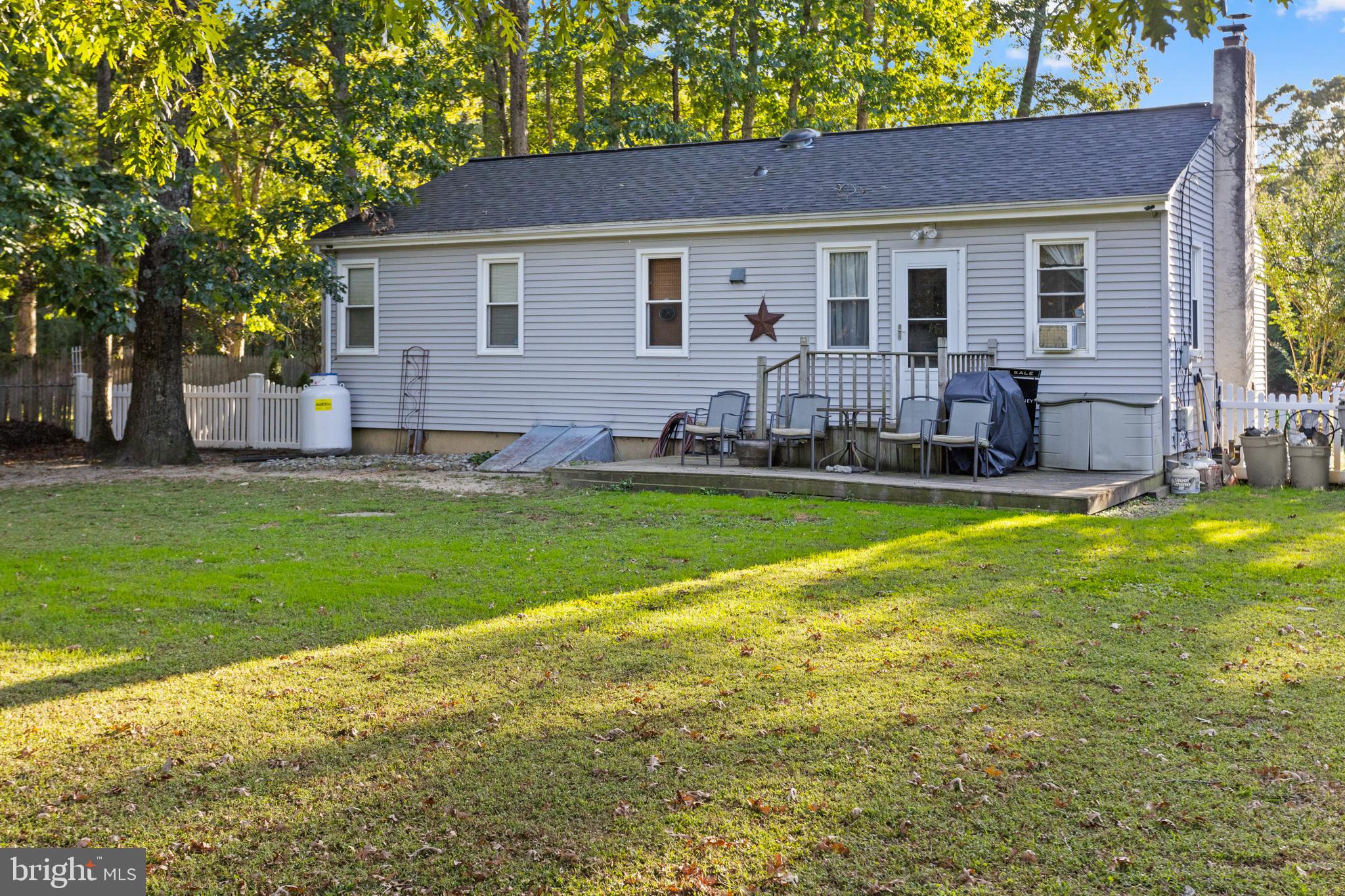 450 Stokes Road Shamong, NJ 08088 - Photo 18 of 35 a house view with swimming pool and garden