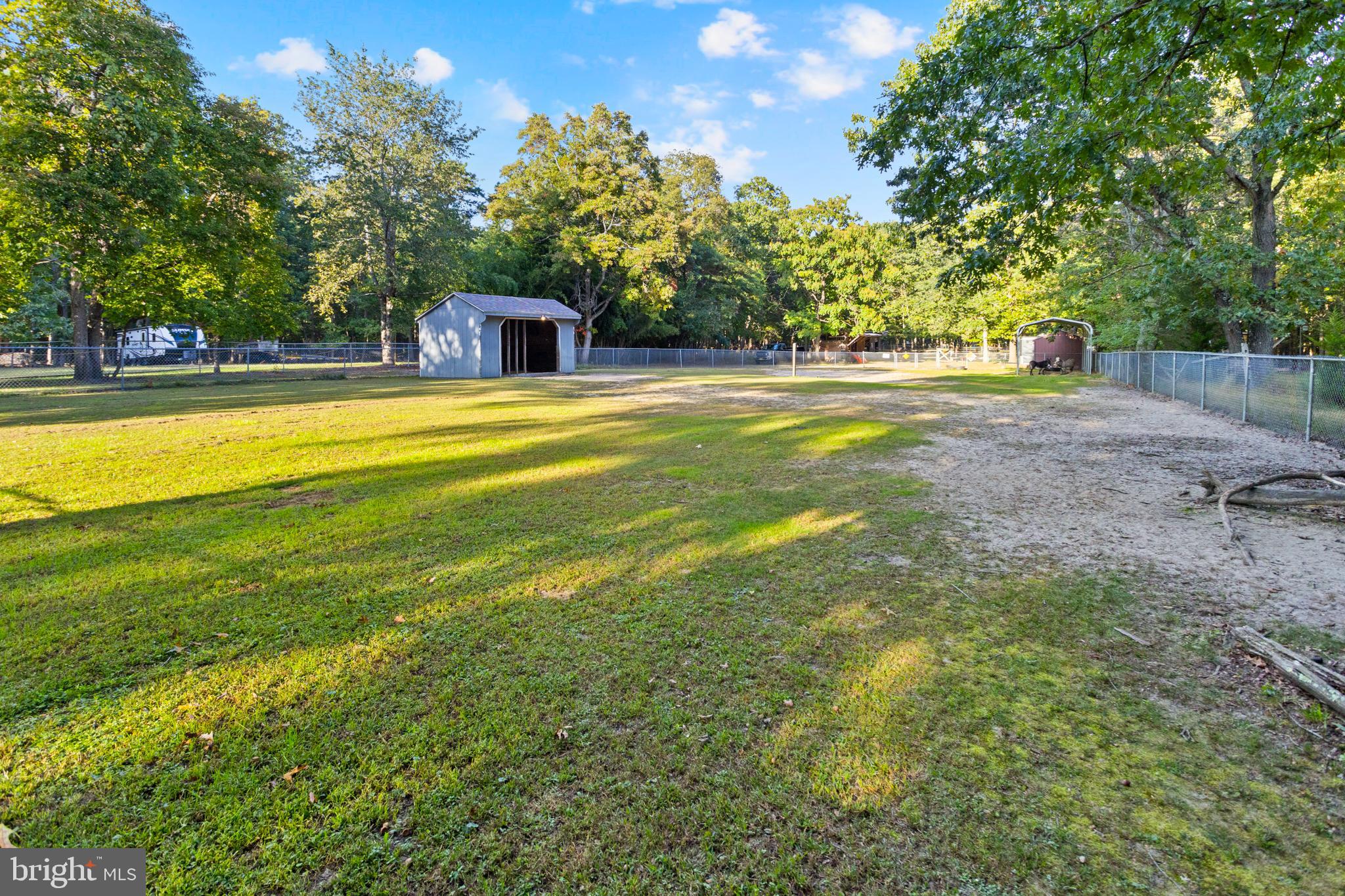 450 Stokes Road Shamong, NJ 08088 - Photo 20 of 35 a house view with swimming pool in front of it