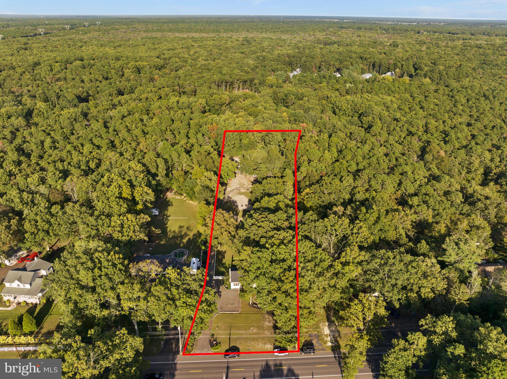 450 Stokes Road Shamong, NJ 08088 - Photo 2 of 35 an aerial view of residential houses with outdoor space and trees
