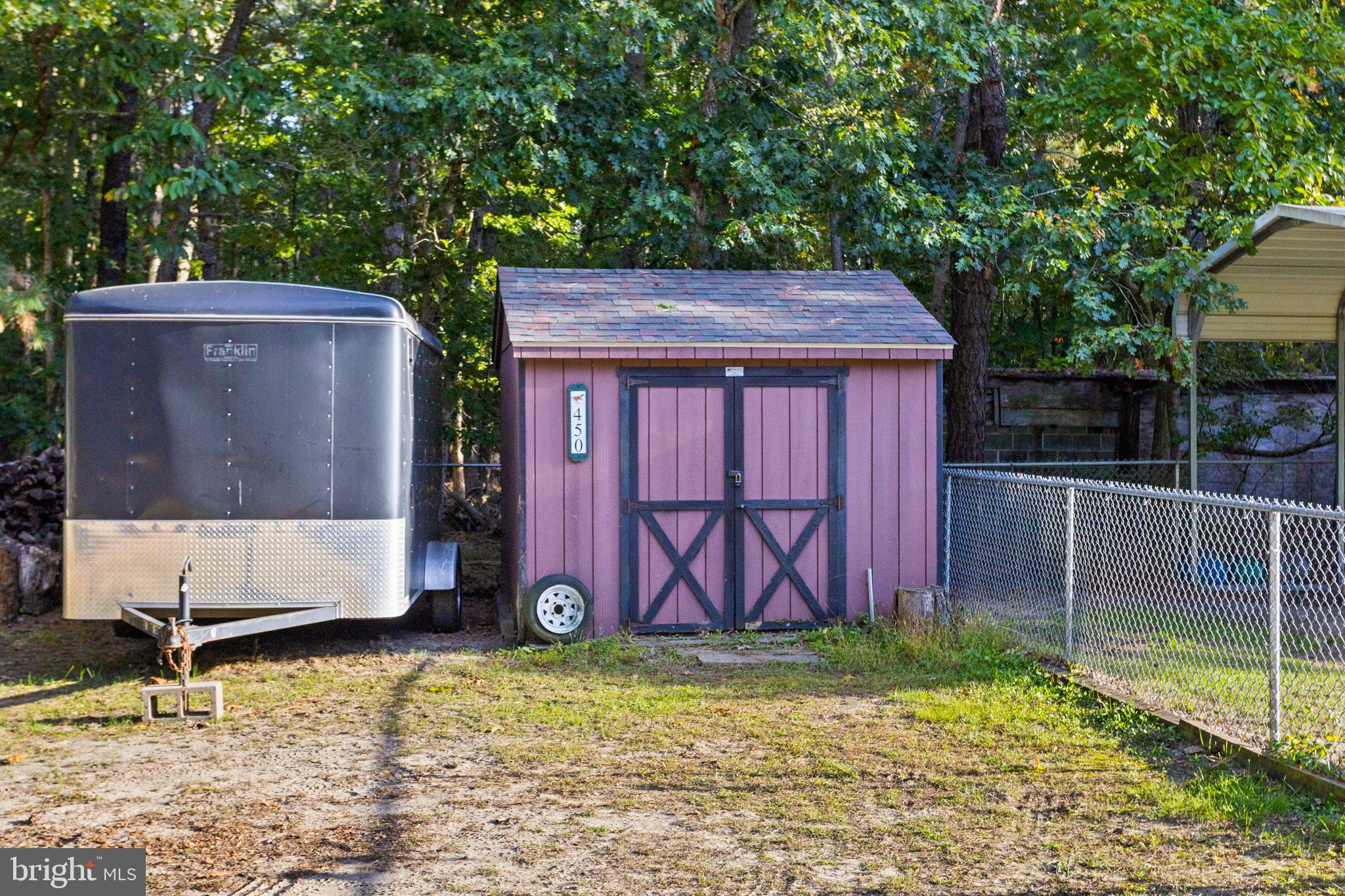 450 Stokes Road Shamong, NJ 08088 - Photo 27 of 35 a view of a backyard with a small cabin