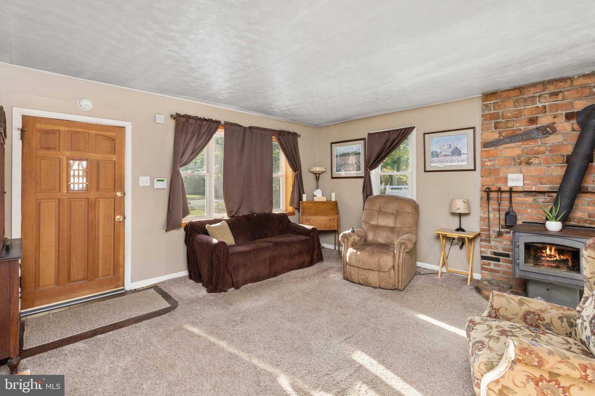 450 Stokes Road Shamong, NJ 08088 - Photo 4 of 35 a living room with furniture and a flat screen tv