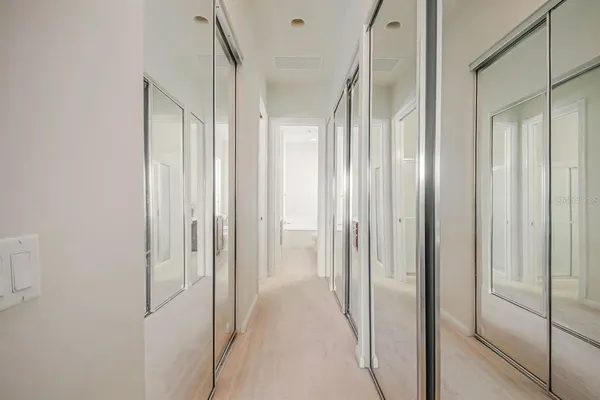 a view of a bathroom from a hallway