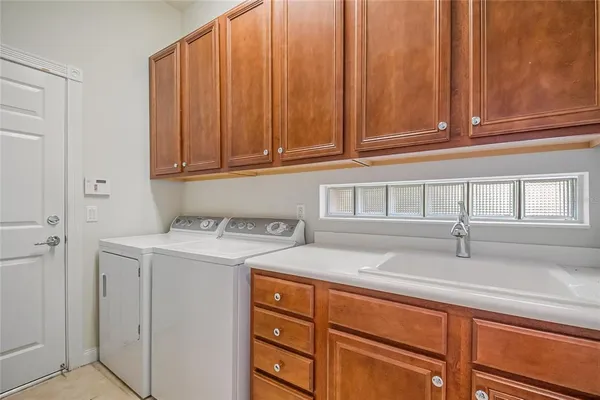a view of a backyard with sitting area