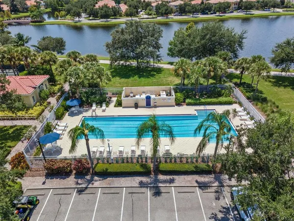 a view of a city with lots of residential buildings ocean and ocean view