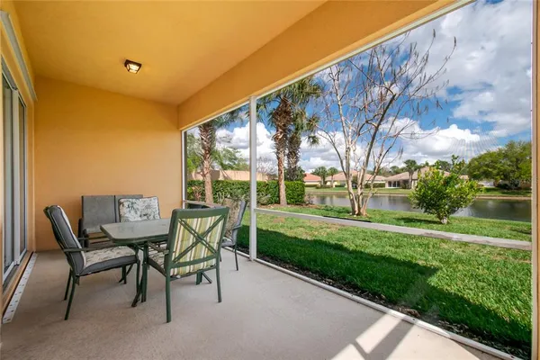 a view of a chairs and table in the garden