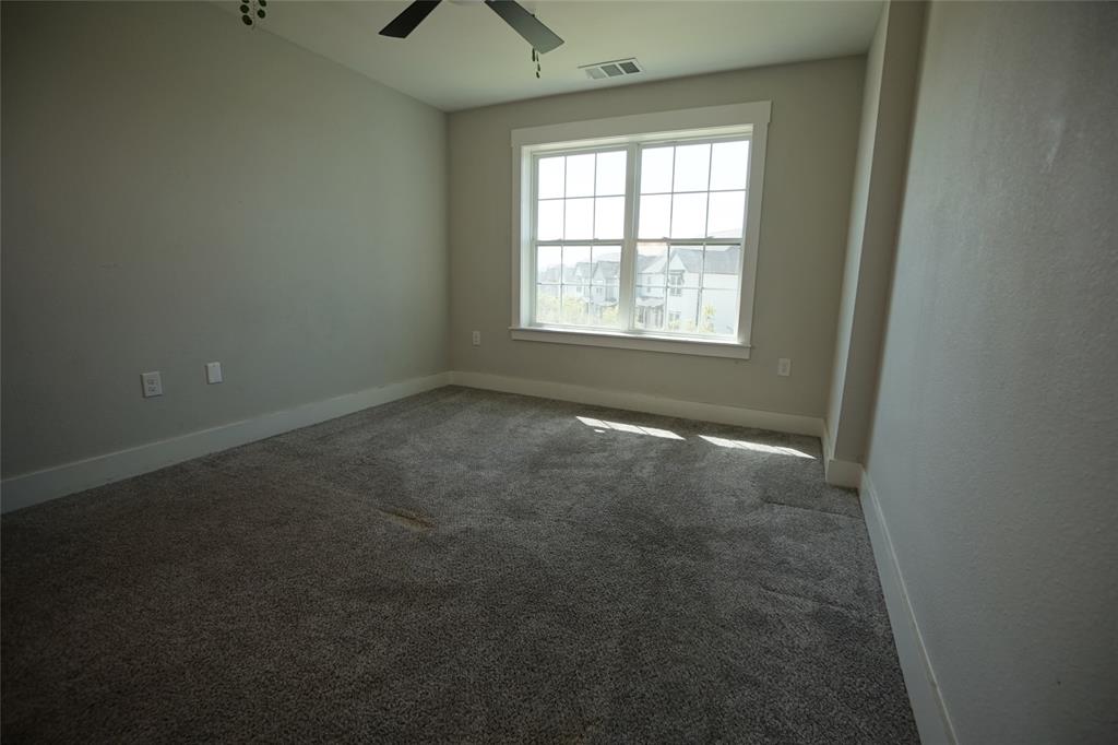1764 Palladio Loop Princeton, TX 75407 - Photo 20 of 40 Neutral-toned walls complement the gray carpeting