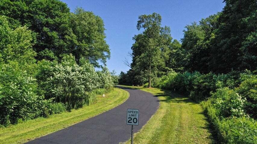 6844 North Modern Way La Porte, IN 46350 - Photo 5 of 17 a view of a yard with plants and trees