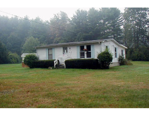 15 Old Turnpike Road Northfield, MA 01360 - Photo 1 of 2 a front view of house with yard and green space