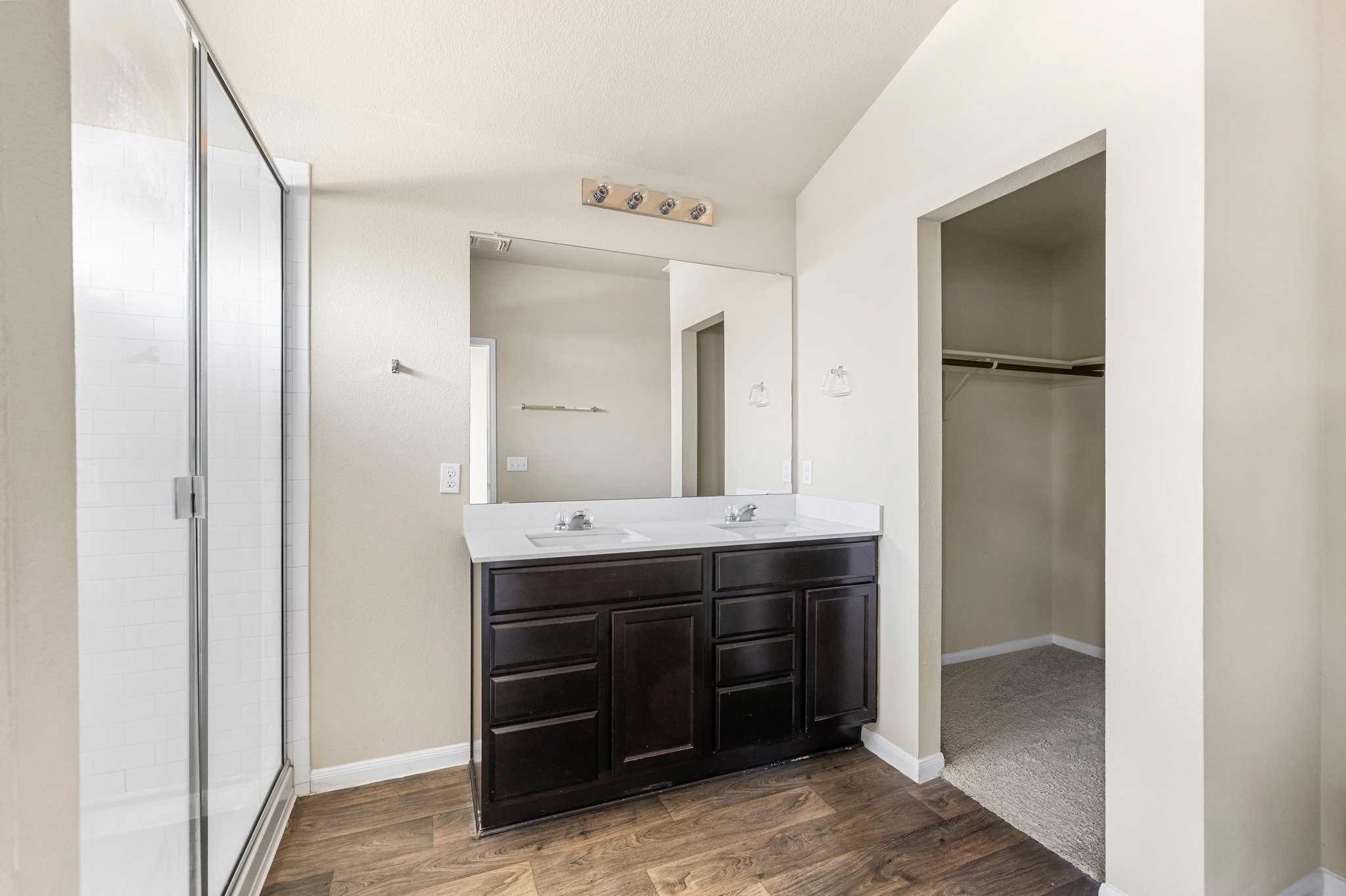 910 Comal Run Hutto, TX 78634 - Photo 14 of 25 Double vanities and extra large walk-in shower.