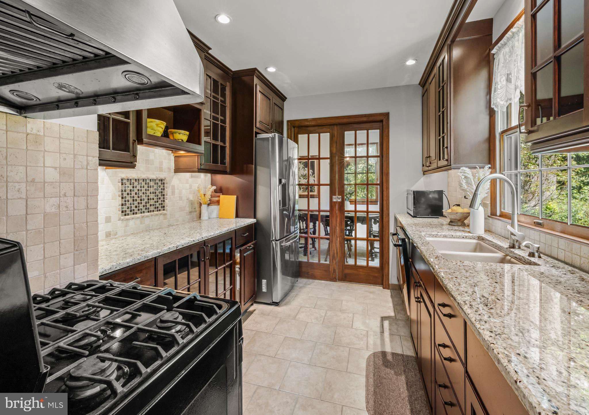 19 Miller Drive Sewell, NJ 08080 - Photo 11 of 20 a kitchen with stainless steel appliances granite countertop a stove and a sink