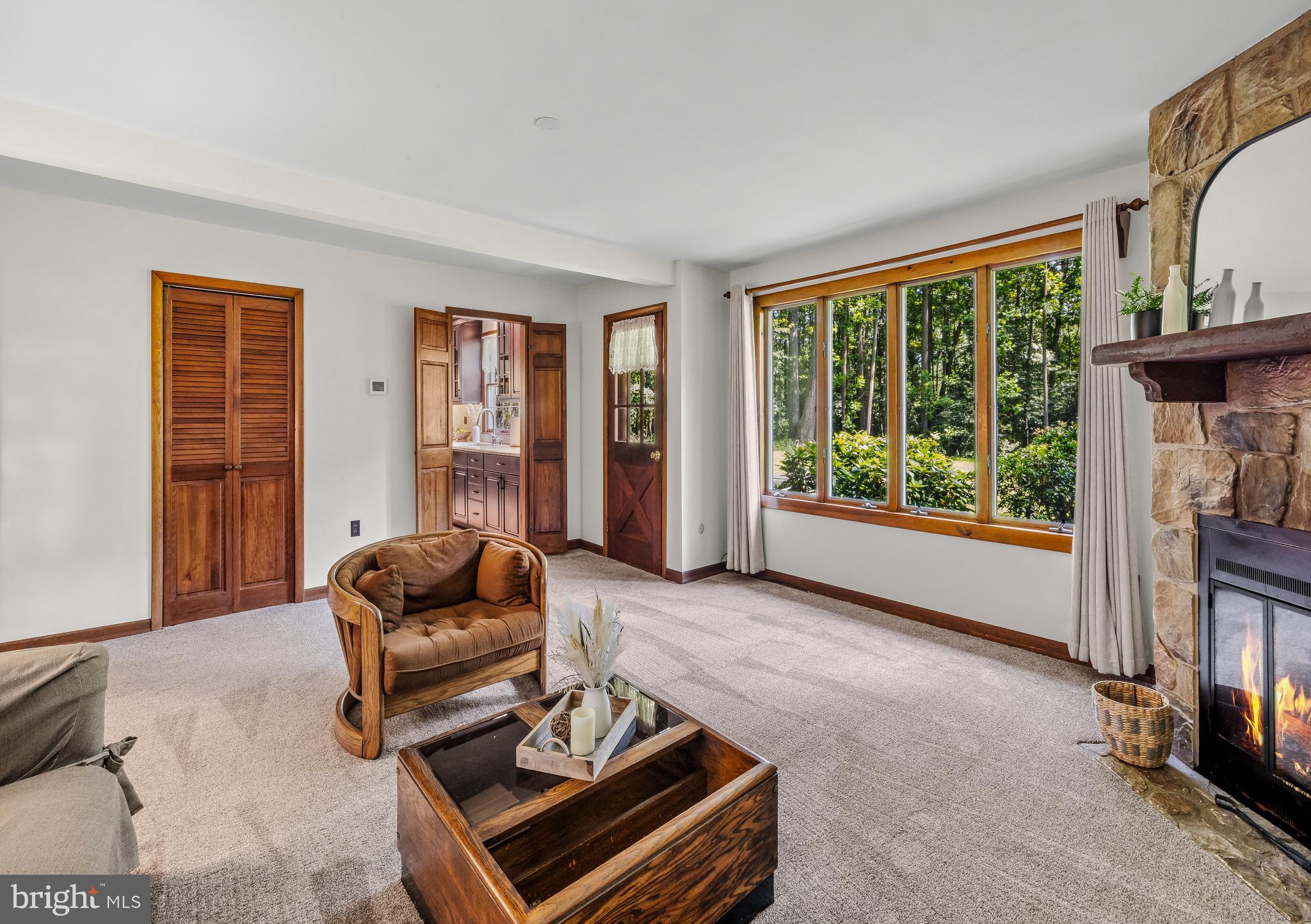 19 Miller Drive Sewell, NJ 08080 - Photo 8 of 20 a living room with furniture and a floor to ceiling window