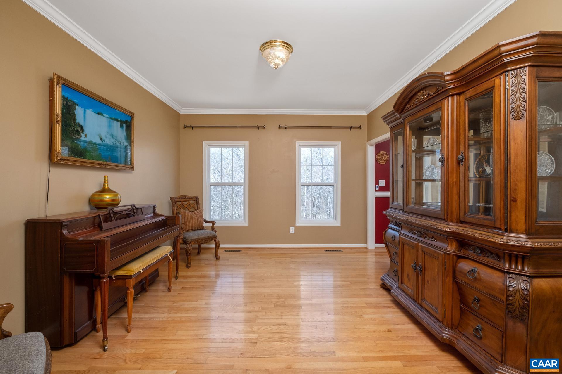 396 Riding Trail Lane Madison, VA 22727 - Photo 13 of 52 a view of a bedroom with furniture window and wooden floor