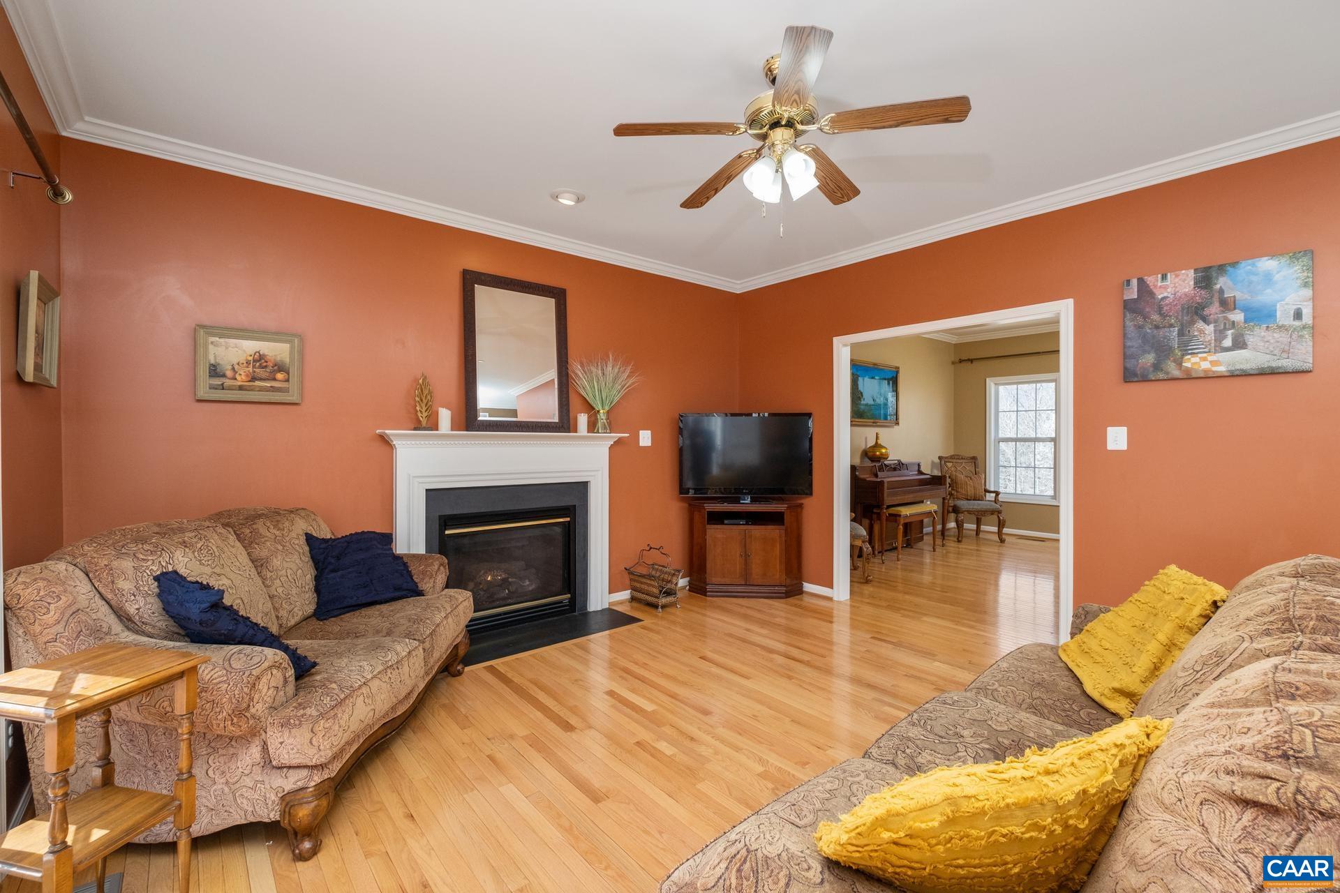 396 Riding Trail Lane Madison, VA 22727 - Photo 14 of 52 a living room with furniture and a fireplace
