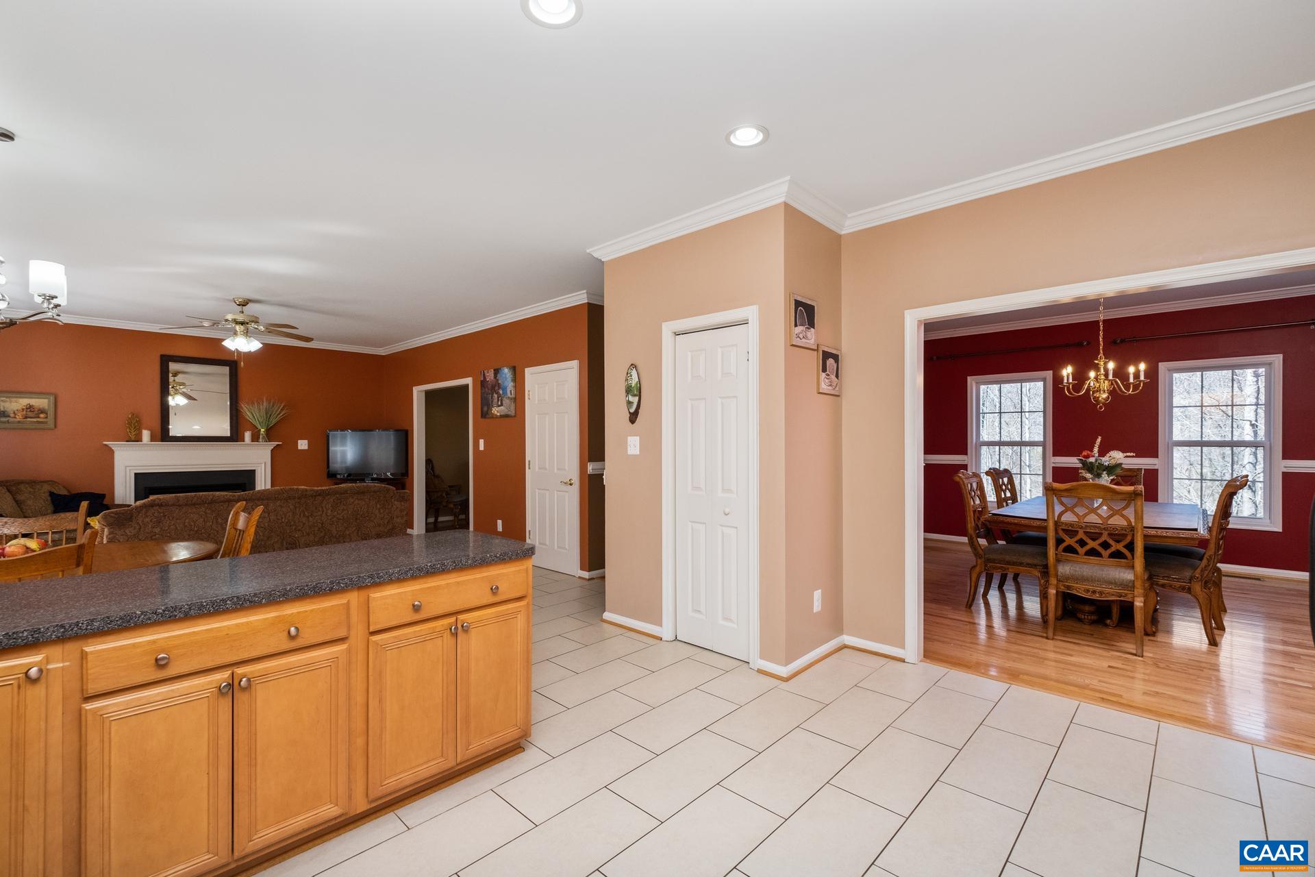 396 Riding Trail Lane Madison, VA 22727 - Photo 19 of 52 a kitchen with stainless steel appliances granite countertop a refrigerator and a sink