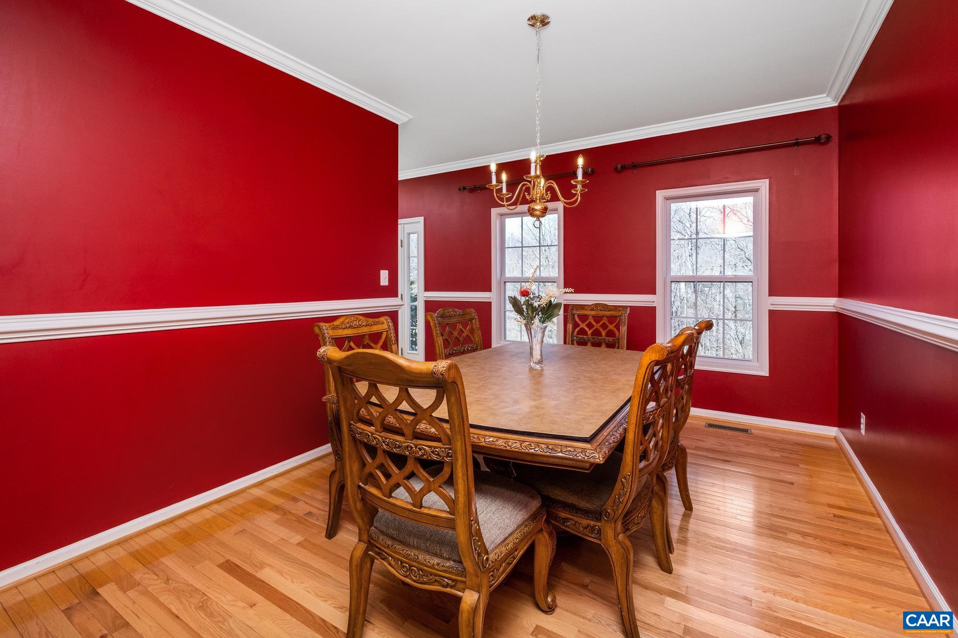396 Riding Trail Lane Madison, VA 22727 - Photo 23 of 52 a view of a dining room with furniture and wooden floor