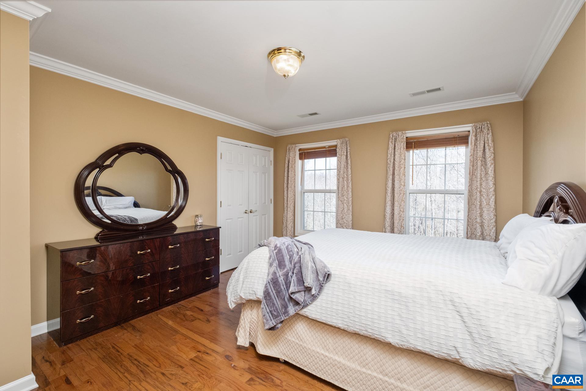 396 Riding Trail Lane Madison, VA 22727 - Photo 34 of 52 a bedroom with a bed and a dresser