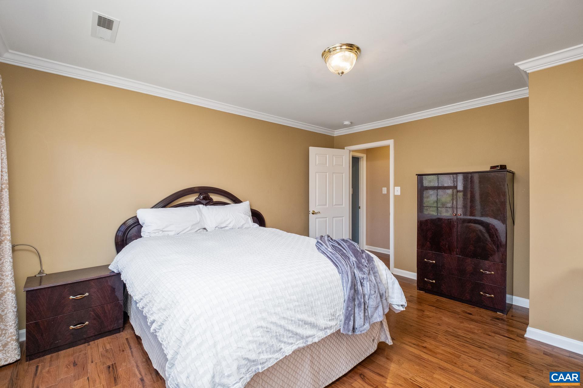 396 Riding Trail Lane Madison, VA 22727 - Photo 35 of 52 a bedroom with a bed and dresser