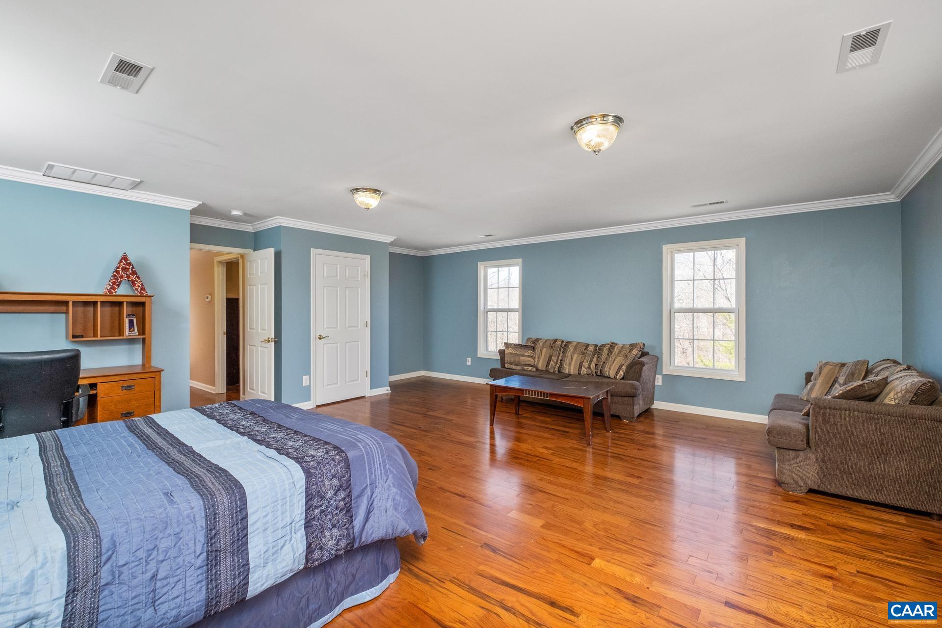 396 Riding Trail Lane Madison, VA 22727 - Photo 37 of 52 a bedroom with a bed and dresser