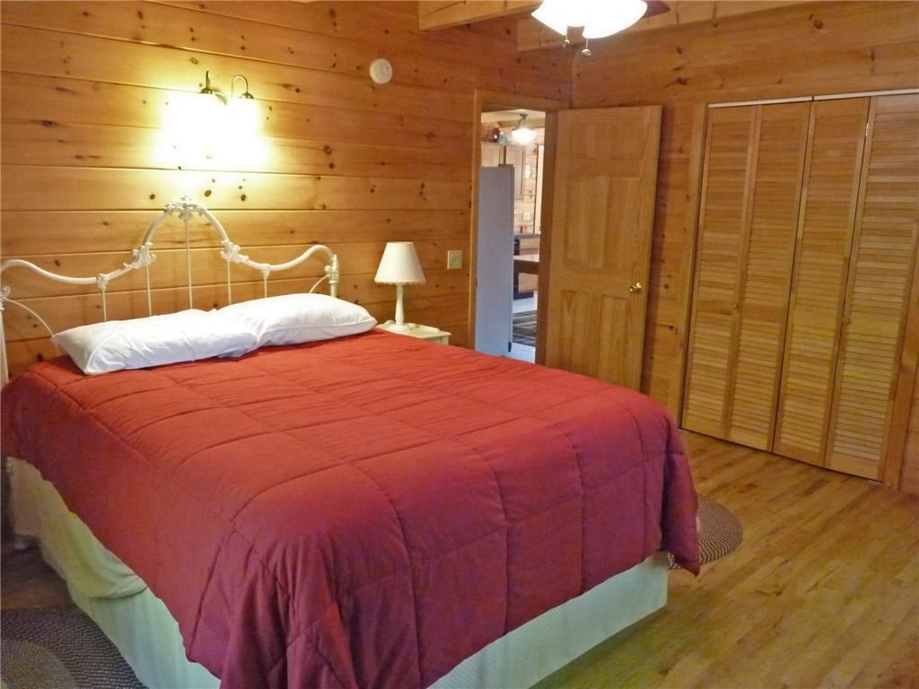 75 Brooks And Dunn Road Otis, ME 04605 - Photo 19 of 35 First floor master bedroom.
