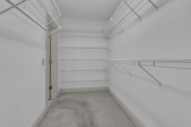 a view of an empty walk in closet