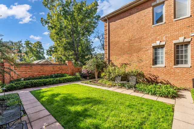 a view of a backyard with garden