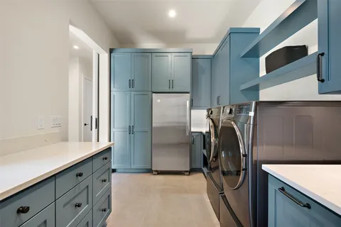 a utility room with washer and dryer