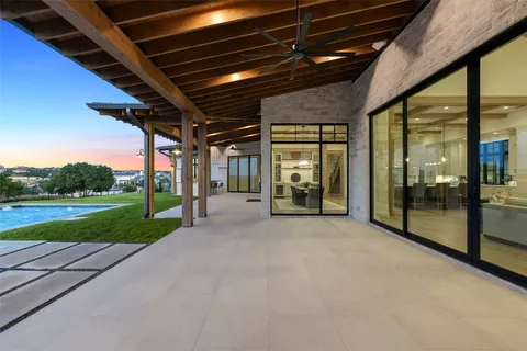 a view of a porch of a house with a yard
