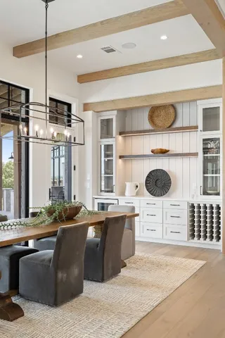 a kitchen with a stove a sink and a refrigerator