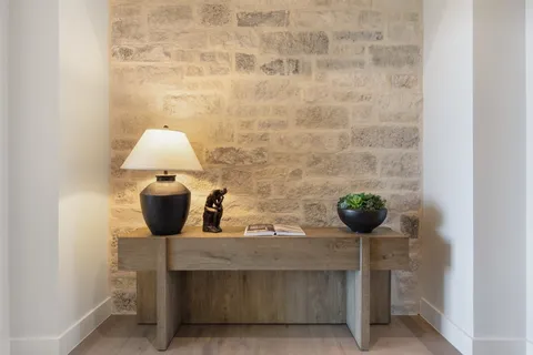 a view of a glass table and chair in a room