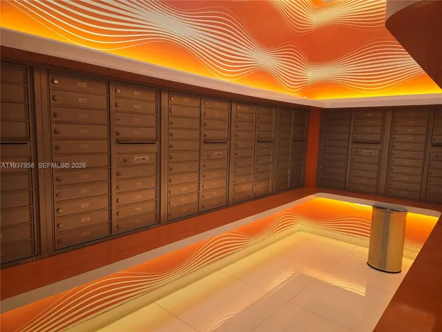 a view of a backyard with wooden walls