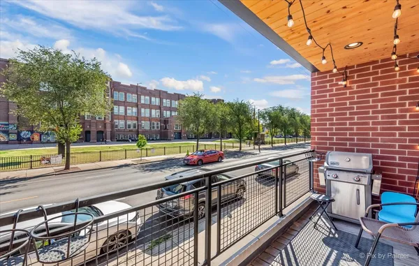 a view of a swimming pool with a lounge chairs