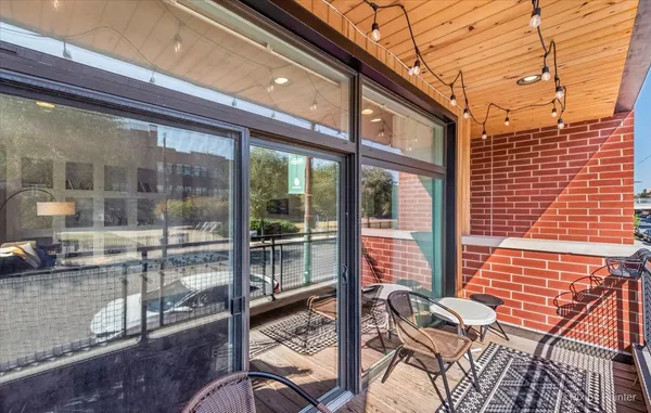 a porch with a glass door