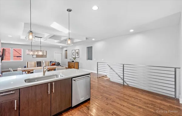 a view of a kitchen and sink