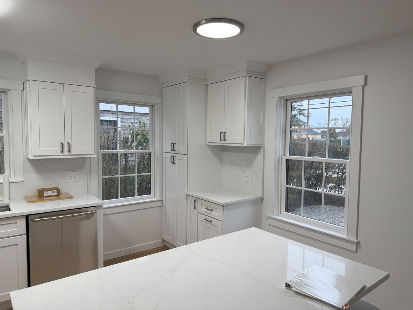 106 Old South Road, Unit A B Nantucket, MA 02554 - Photo 5 of 24 a kitchen with a window and a sink